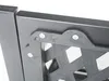 A close-up view of a black metal garden bench attachment with screws. Produktbild-Vorschau