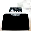 A digital scale displaying weight and temperature. Voir les images du produit