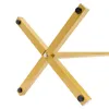 A close-up view of the base of a gold-colored coat rack stand. Produktbild-Vorschau