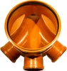 A top-down view of an orange plastic drainage junction piece with three inlets and one outlet. Produktbild-Vorschau