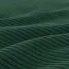 A close-up, abstract view of a green, ribbed surface that appears to be fabric, with undulating waves. Produktbild-Vorschau