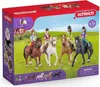 A box of Schleich Horse Club toys featuring horses and riders in a grassy field setting. Náhľad obrázku produktu