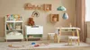 A child's playroom with a table, chairs, and storage units. Produktbild-Vorschau