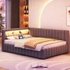 A modern L-shaped bed with integrated LED lighting and a plush velvet fabric. Náhled obrázku produktu