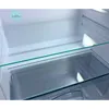 Inside of a clean, empty refrigerator showing glass shelves and drawers. Produktbild-Vorschau