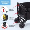 Close-up view of a black foldable wagon with features highlighted by text and arrows. Podgląd zdjęcia produktu