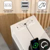 Close-up of a bedside table with integrated charging features, showing a phone and smartwatch charging. Voir les images du produit