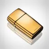 A golden-colored product is shown against a white and light gray gradient background, with its reflection visible below. Anteprima dell’immagine prodotto