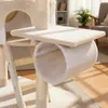 A close-up view of a beige and white cat tree, showing a tunnel and a platform. Produktbild-Vorschau