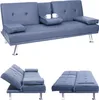 Three views of a dark blue convertible sofa, showing it in its sofa form, partially converted, and fully converted to a bed.