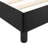 Close-up of the corner of a black bed frame with wooden slats. Produktbild-Vorschau