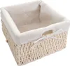 A woven basket with a fabric lining, tied with a ribbon. Produktbild-Vorschau