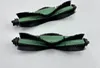 Two vacuum cleaner brush rolls are shown against a white background. Voir les images du produit