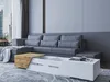 A modern living room with a sectional sofa and a coffee table. Náhled obrázku produktu