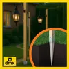 Garden path with lampposts and a close-up of a ground spike for a post. Produktbild-Vorschau