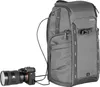 A gray Vanguard camera backpack with a camera attached by a cable. Anteprima dell’immagine prodotto