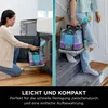 A split image showing a woman cleaning under a sink and another person carrying a cleaning device up stairs. Podgląd zdjęcia produktu