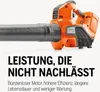 A close-up marketing image of an orange and black leaf blower with text describing its features. Podgląd zdjęcia produktu