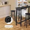 A black bar table and stools are set up in a kitchen or dining area. Náhľad obrázku produktu