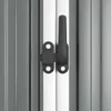 A close-up of a dark gray latch mechanism on a silver metal door or panel. Podgląd zdjęcia produktu