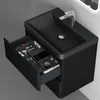A black bathroom vanity with an open drawer displaying various makeup items. Anteprima dell’immagine prodotto