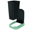 A black trash can with a green base and a black lid are shown separately against a white background. Anteprima dell’immagine prodotto
