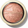 A close-up, top-down view of a round makeup compact with a gold-colored rim and a bronzed, marbled powder inside. Anteprima dell’immagine prodotto
