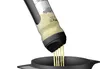 A GEFU Crêpes-SpätzleMix TWISTER is shown dispensing batter into a pan. Produktbild-Vorschau