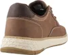 A close-up side view of a brown leather sneaker. Náhľad obrázku produktu
