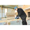 A construction worker is using a power planer on a wooden beam in a building under construction. Anteprima dell’immagine prodotto