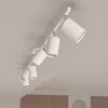 A white track lighting fixture with multiple adjustable spotlights mounted on a white ceiling. Podgląd zdjęcia produktu