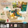 The image shows the back of a board game box for 'Harmonies', featuring game components, instructions, and branding. Produktbild-Vorschau