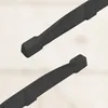 A close-up view of two black metal grates, likely for a fireplace or oven, against a blurred background. Náhľad obrázku produktu