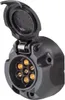 A black 7-pin trailer socket with a hinged cover, showing the gold-colored pins inside. Produktbild-Vorschau