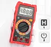 A hand wearing a white glove holds a red digital multimeter. Podgląd zdjęcia produktu