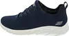 A side view of a navy blue Skechers sneaker with a white sole. Voir les images du produit