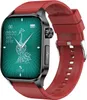 A close-up studio shot of a smartwatch with a red band and a green watch face displaying a peacock design.