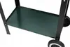 A close-up view of the lower section of a charcoal grill, showing a green shelf and black wheels. Produktbild-Vorschau