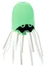 A glow-in-the-dark jellyfish toy with a black bat-like face and white tentacles, set against a white background. Produktbild-Vorschau