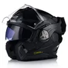 A black motorcycle helmet shown from a three-quarter front angle against a white background. Náhled obrázku produktu