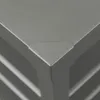 A close-up view of the corner of a gray storage box, showing its construction. Produktbild-Vorschau