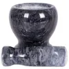 A mortar and pestle made of dark gray and black marbled stone, presented on a white background. Voir les images du produit