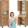 A woman is holding a measuring tape in front of two tall cabinets. Podgląd zdjęcia produktu