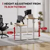 Two standing desks are shown in a home office setting with blinds in the background. Voir les images du produit