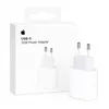 A white Apple 20W USB-C power adapter and its packaging. Produktbild-Vorschau