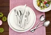 A table setting with cutlery and a salad, suggesting a meal. Anteprima dell’immagine prodotto