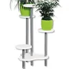 A multi-tiered plant stand with three green pots holding plants, set against a white background. Anteprima dell’immagine prodotto