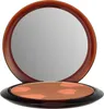 A makeup compact with a mirror open, showing the bronzer inside. Voir les images du produit