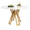 A round dining table with a marble-like top and golden legs, set against a white background. Podgląd zdjęcia produktu