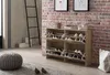 A shoe cabinet in a hallway with a brick wall and a ladder in the background. Produktbild-Vorschau